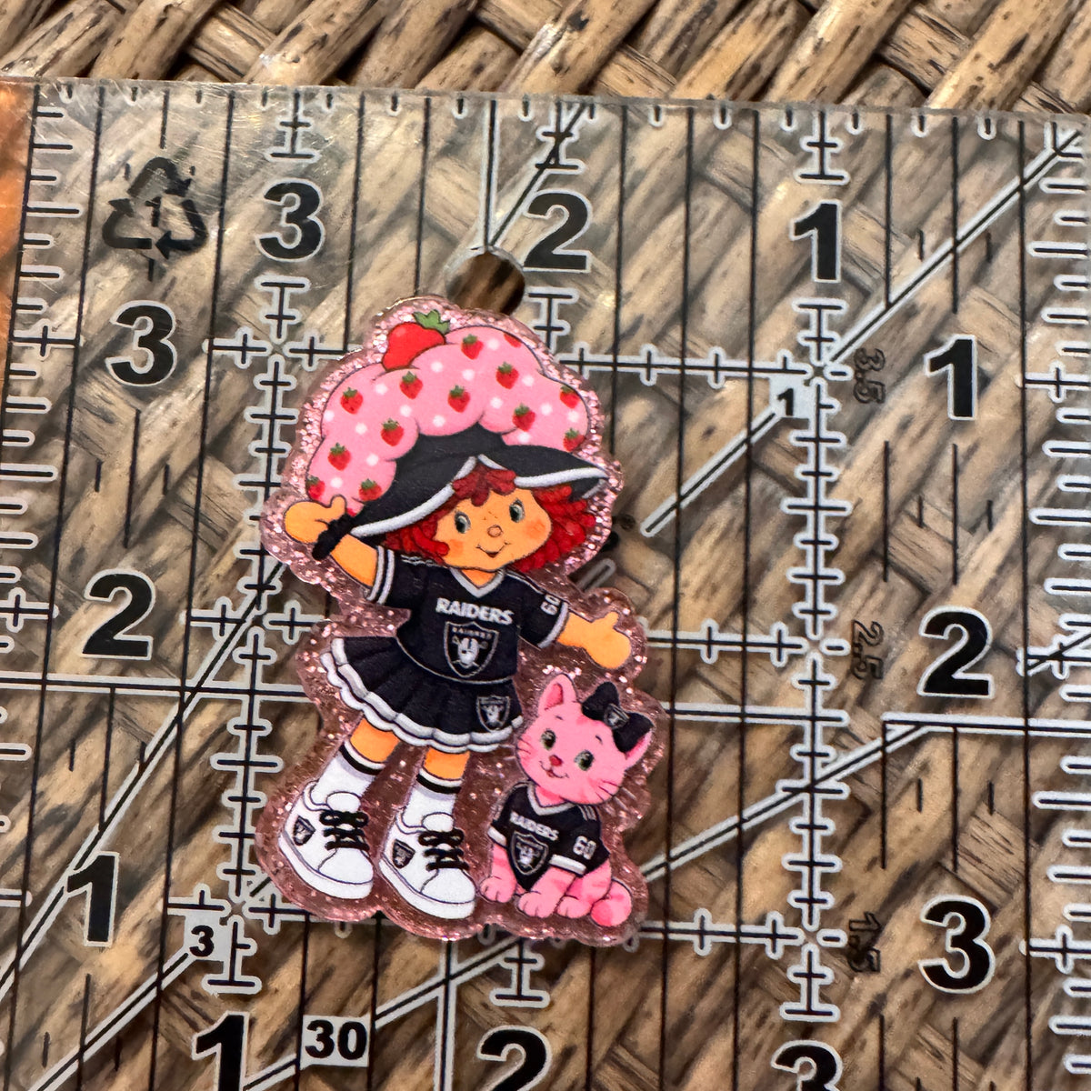 Acrylic Flatback Craft Embellishment - Strawberry SHortcake Wearing Raiders football team outfit
