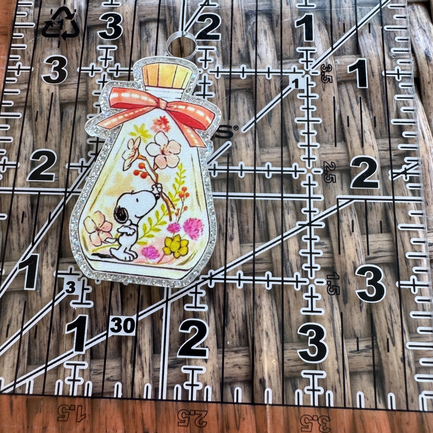 Snoopy in a bottle with flowers Acrylic Flatback Planar, Cabochon, Single Pc.