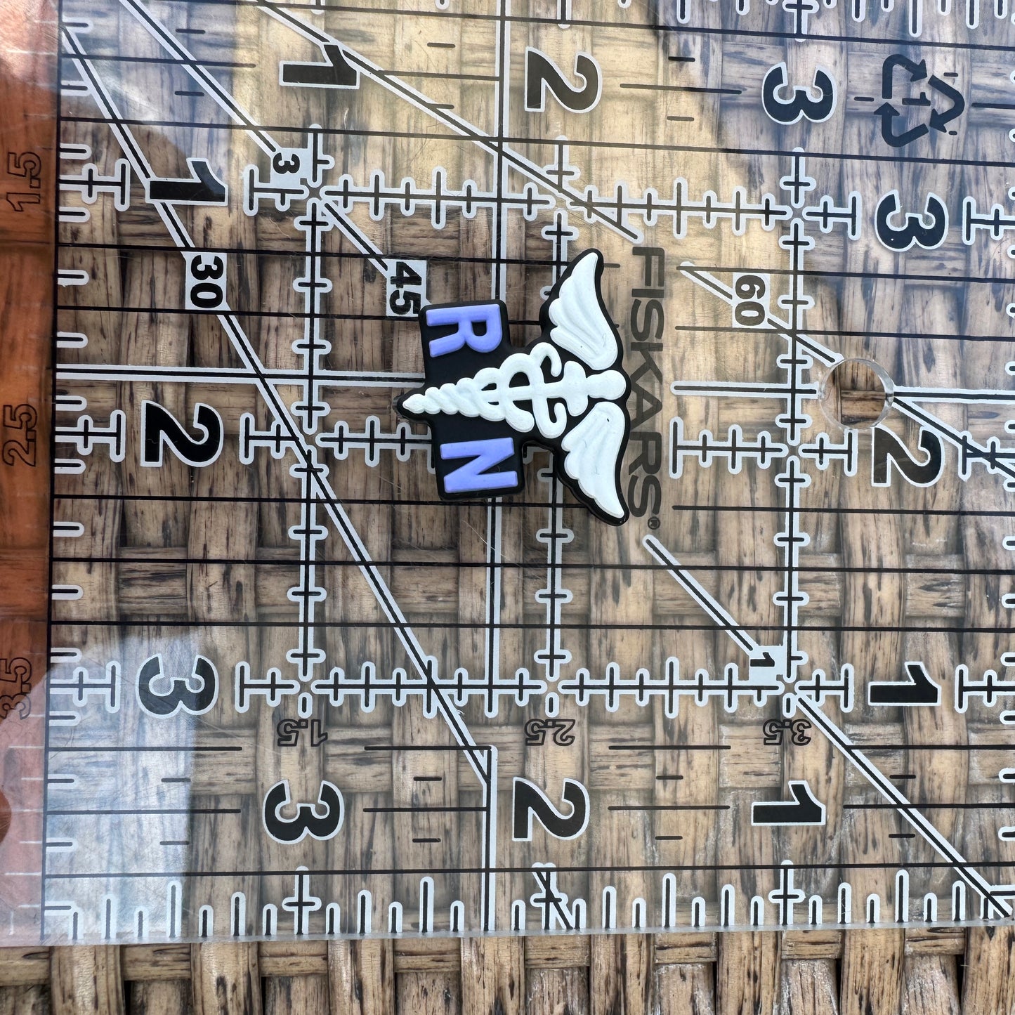 Silicone Flocal Bead Nurse RN Symbol